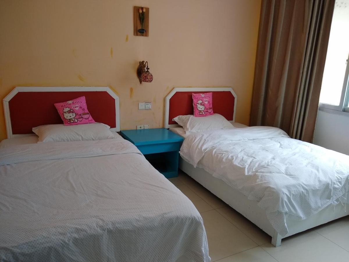 Yangshuo How Flowers Hostel Bagian luar foto