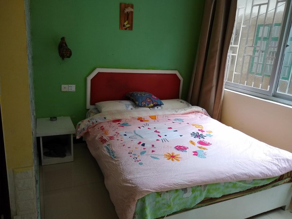 Yangshuo How Flowers Hostel Bagian luar foto