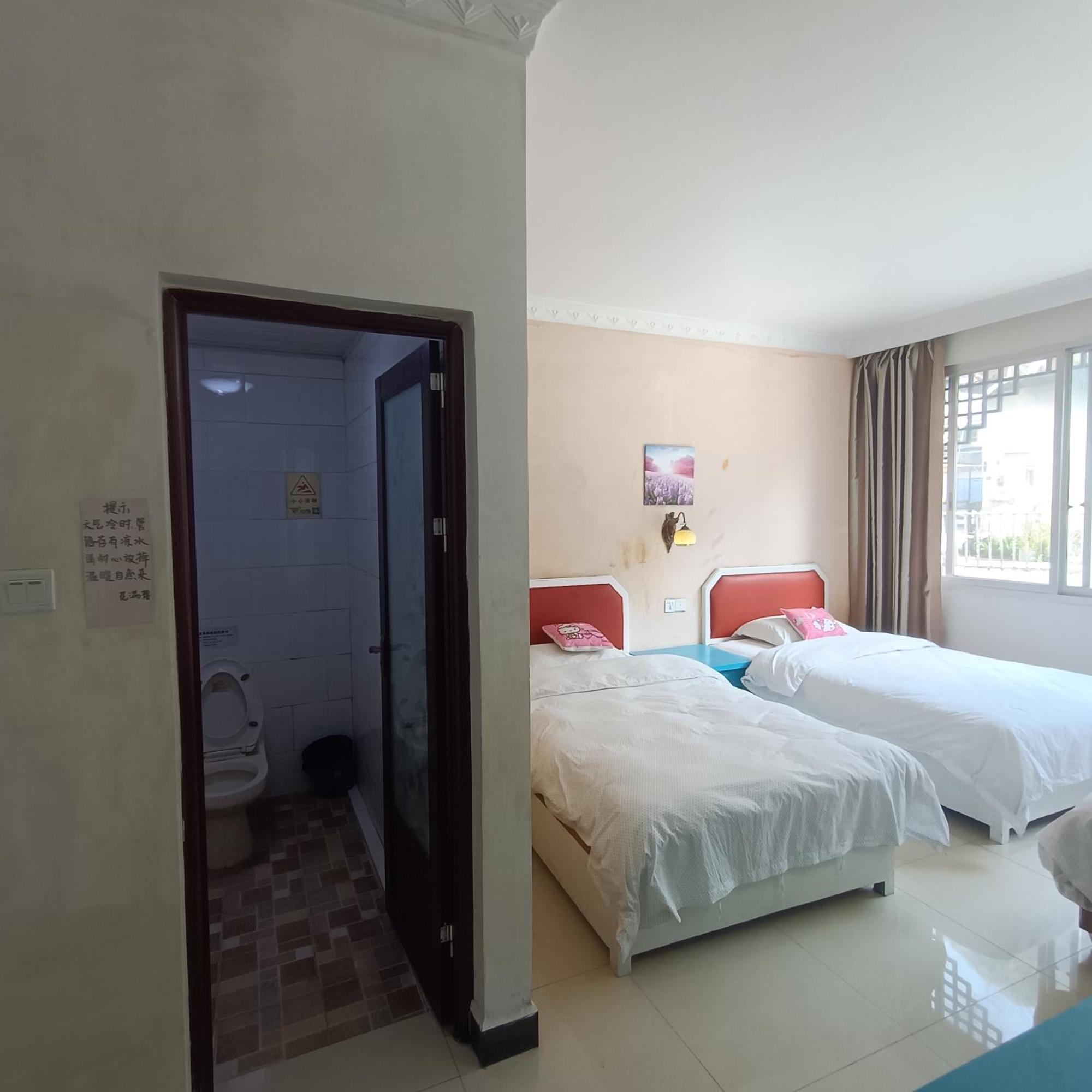 Yangshuo How Flowers Hostel Bagian luar foto