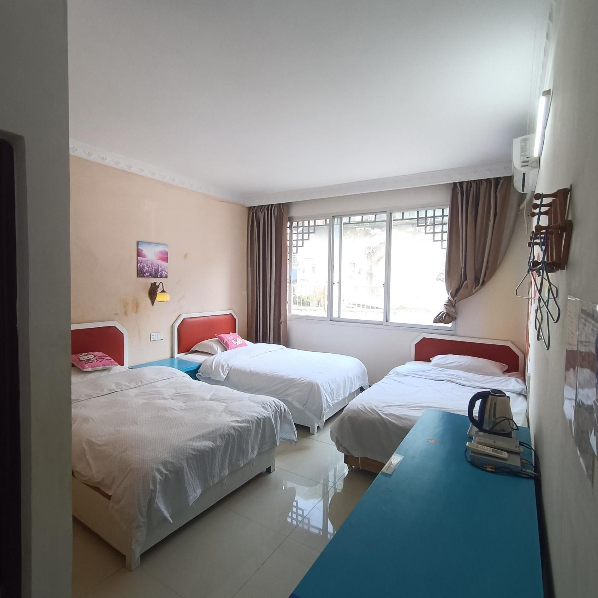 Yangshuo How Flowers Hostel Bagian luar foto