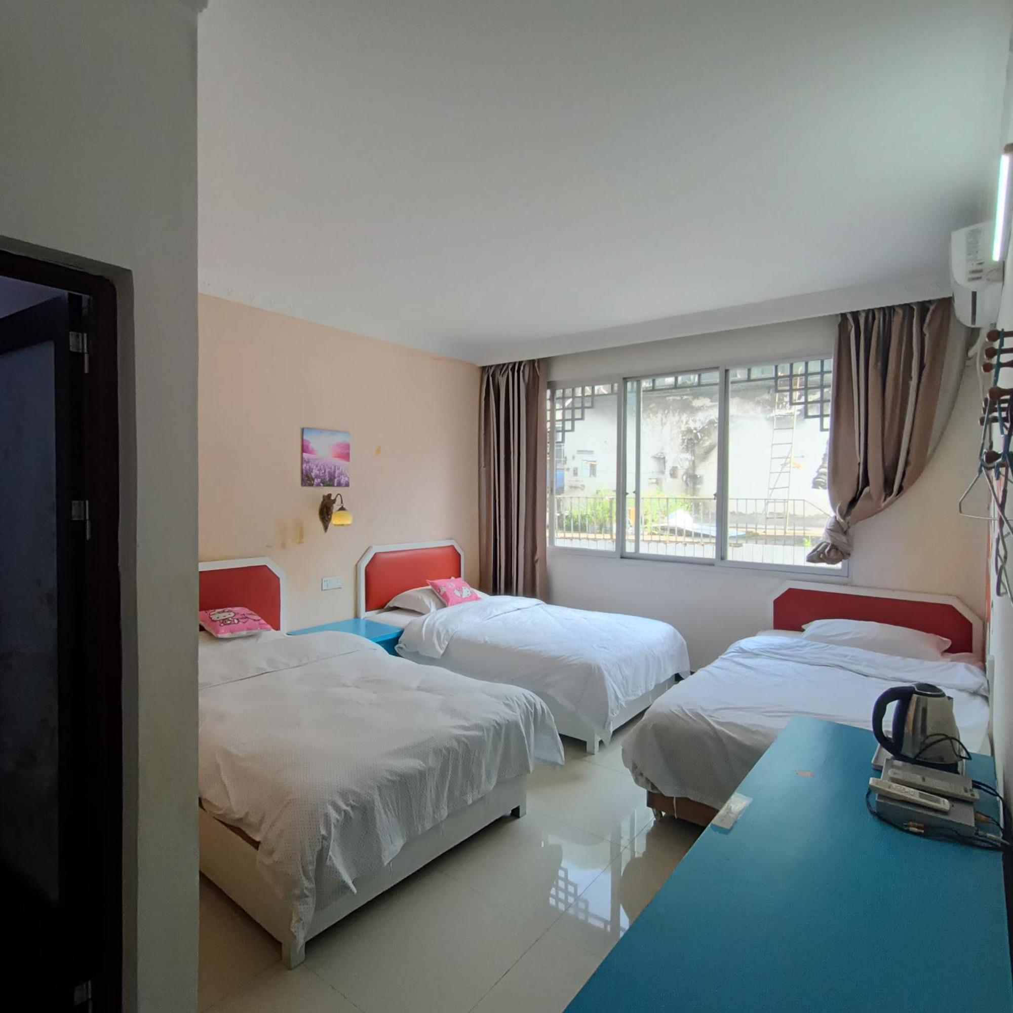 Yangshuo How Flowers Hostel Bagian luar foto