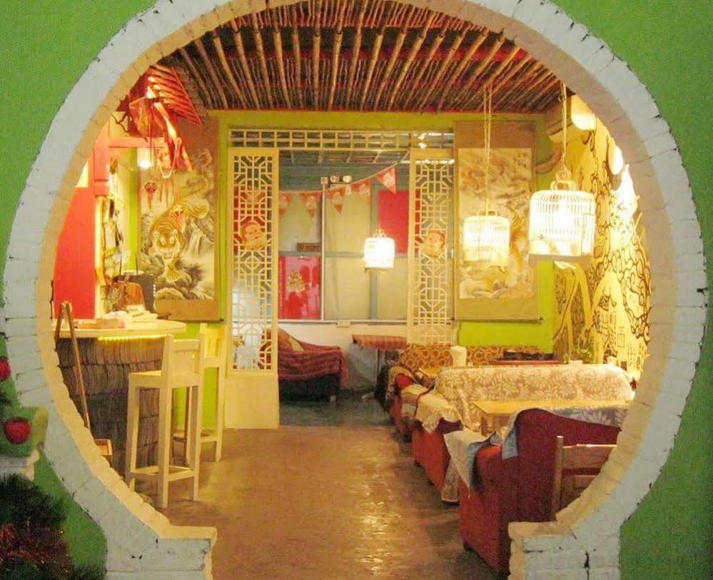 Yangshuo How Flowers Hostel Bagian luar foto